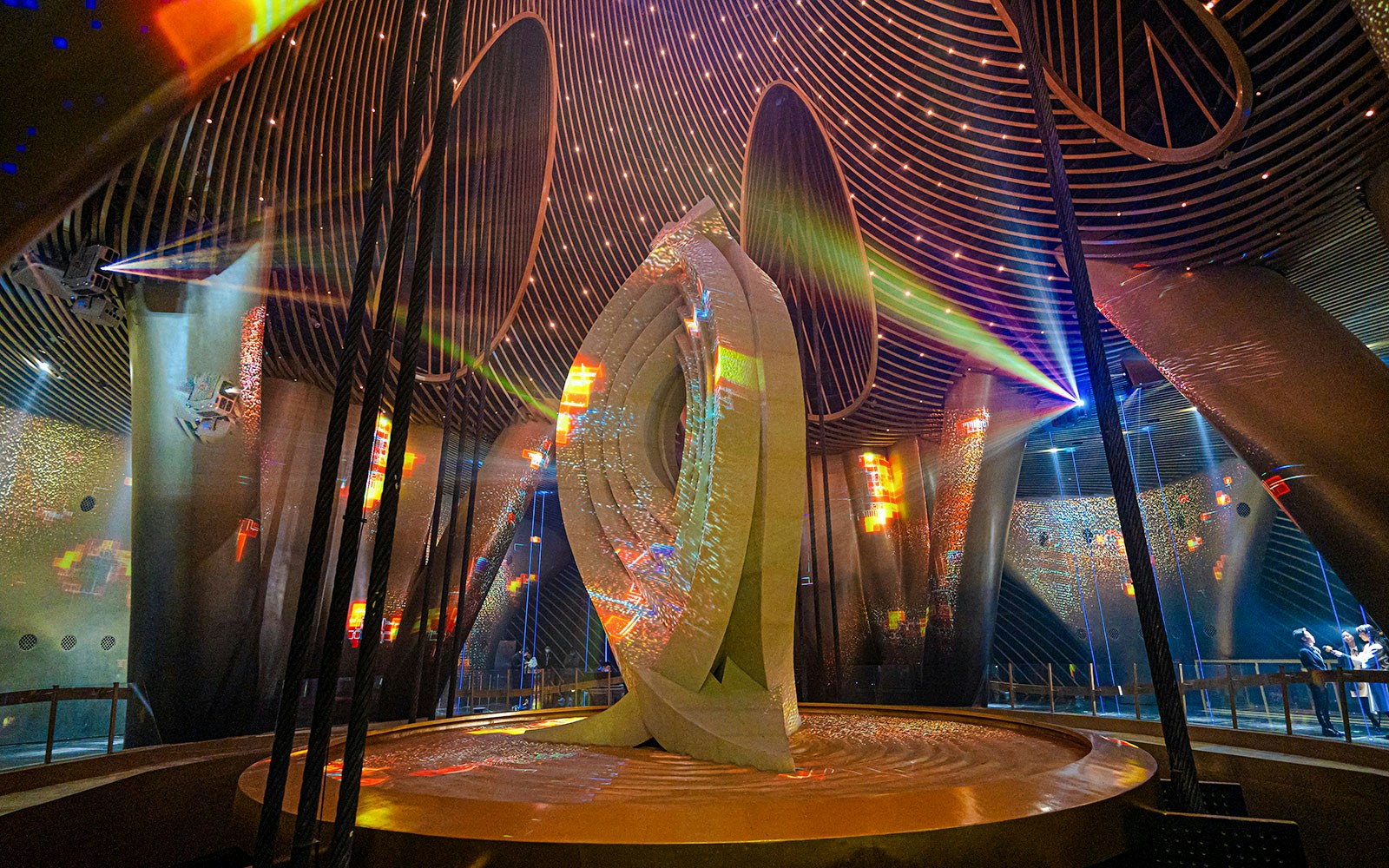 Eye of Shanghai sculpture with colorful lights inside Shanghai Tower.