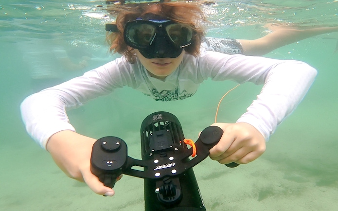 Person using underwater scooter in Saint-Jean-Cap-Ferrat, Nice, France.