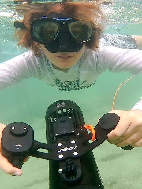 Person using underwater scooter in Saint-Jean-Cap-Ferrat, Nice, France.