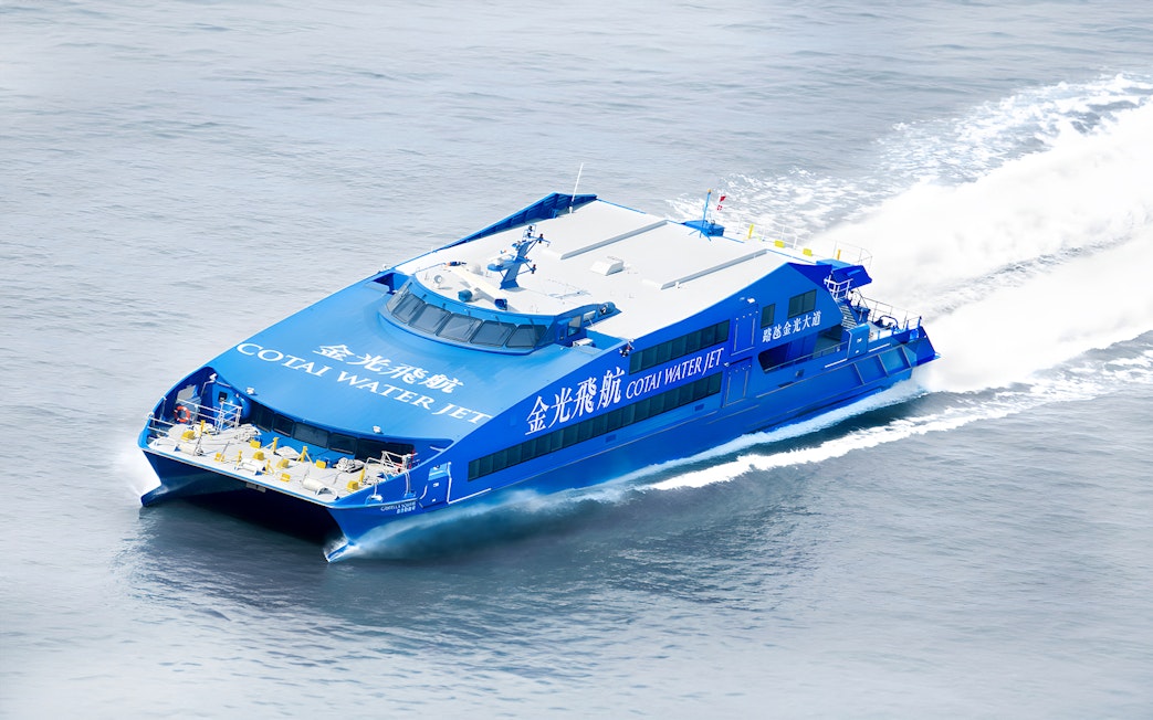 Cotai Water Jet ferry traveling between Hong Kong and Macau (Taipa) on open water.