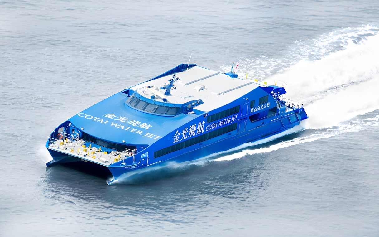 Cotai Water Jet ferry traveling between Hong Kong and Macau (Taipa) on open water.