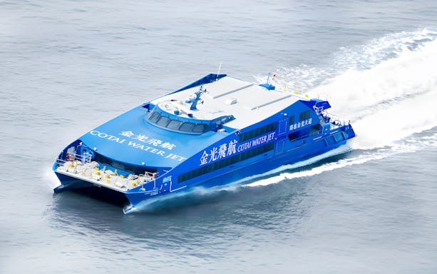 Cotai Water Jet ferry traveling between Hong Kong and Macau (Taipa) on open water.