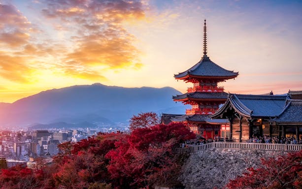 Kiyomizu-dera Temple at sunset with autumn foliage, Kyoto Day Tour from Osaka Namba.