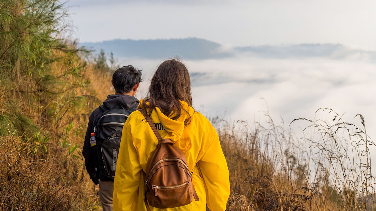 A couple trekking around Mount Batur