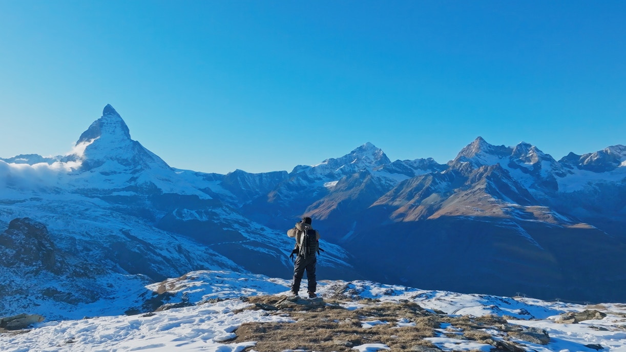 Traveler photographing the Matterhorn from Gornergrat, Switzerland.
