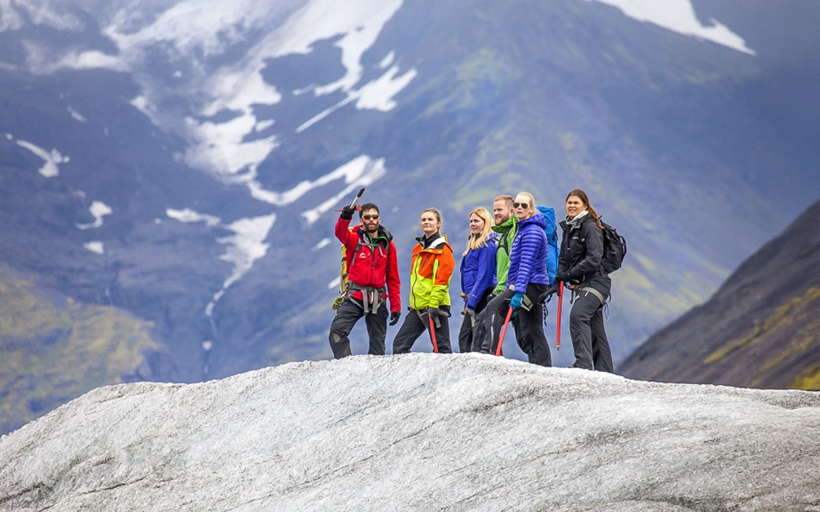 Guests hiking and ice climbing on a glacier in Skaftafell, Iceland.