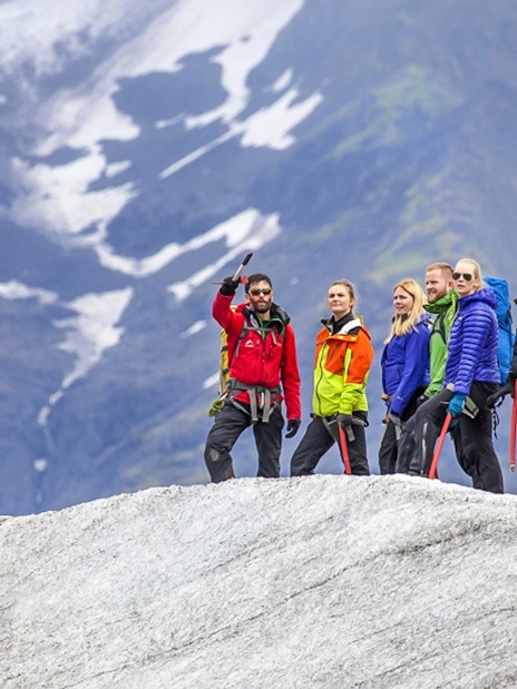 Guests hiking and ice climbing on a glacier in Skaftafell, Iceland.