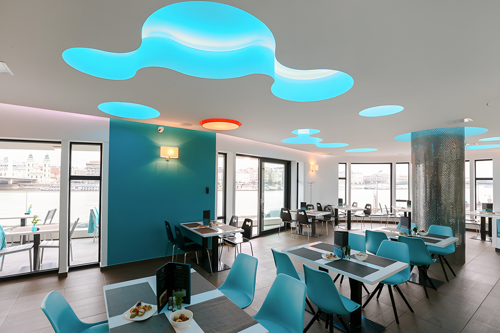 Indoor seating area at a restaurant in Rudas Bath, Budapest.