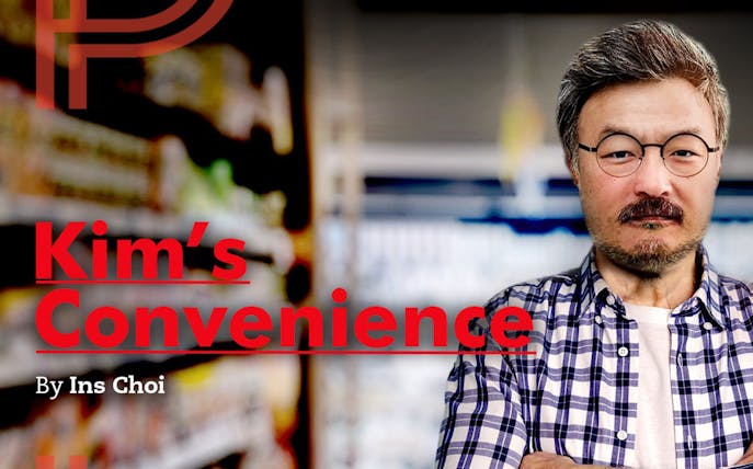 Man in plaid shirt standing in front of store shelves, text reads 'Kim’s Convenience' by Ins Choi.