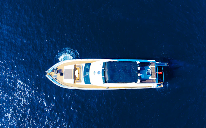 Aerial view of a yacht cruising on the Bosphorus in Istanbul.