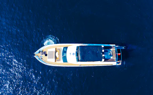 Aerial view of a yacht cruising on the Bosphorus in Istanbul.