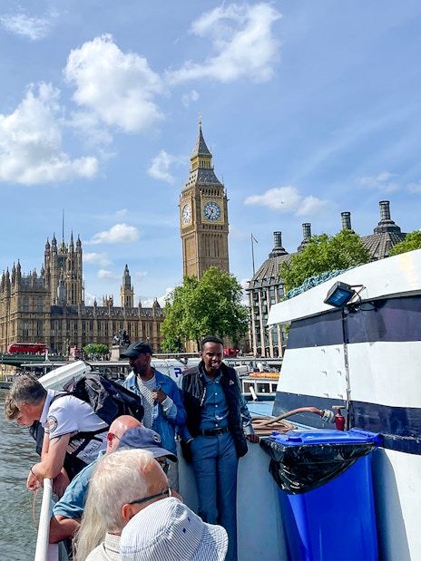 Westminster sightseeing cruise with view of Big Ben and Houses of Parliament in London.
