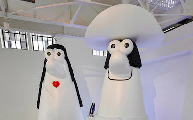 Cartoon sculptures at Lavazza Museum, Turin, part of the Hop-on Hop-off Bus Tour.