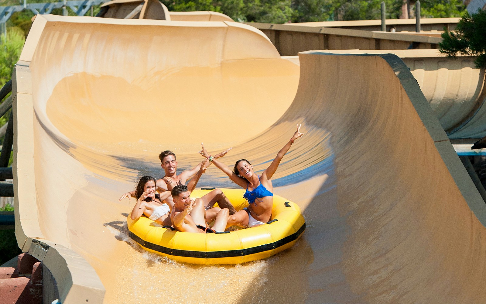 Group enjoying the Grand Canyon water slide at Western Water Park.