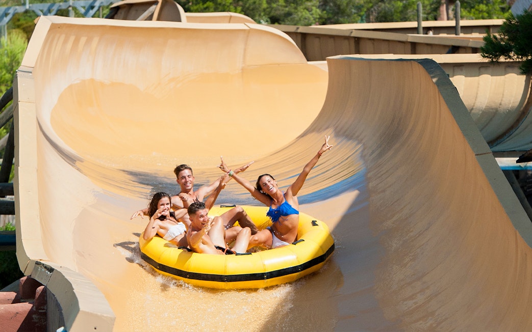 Group enjoying the Grand Canyon water slide at Western Water Park.