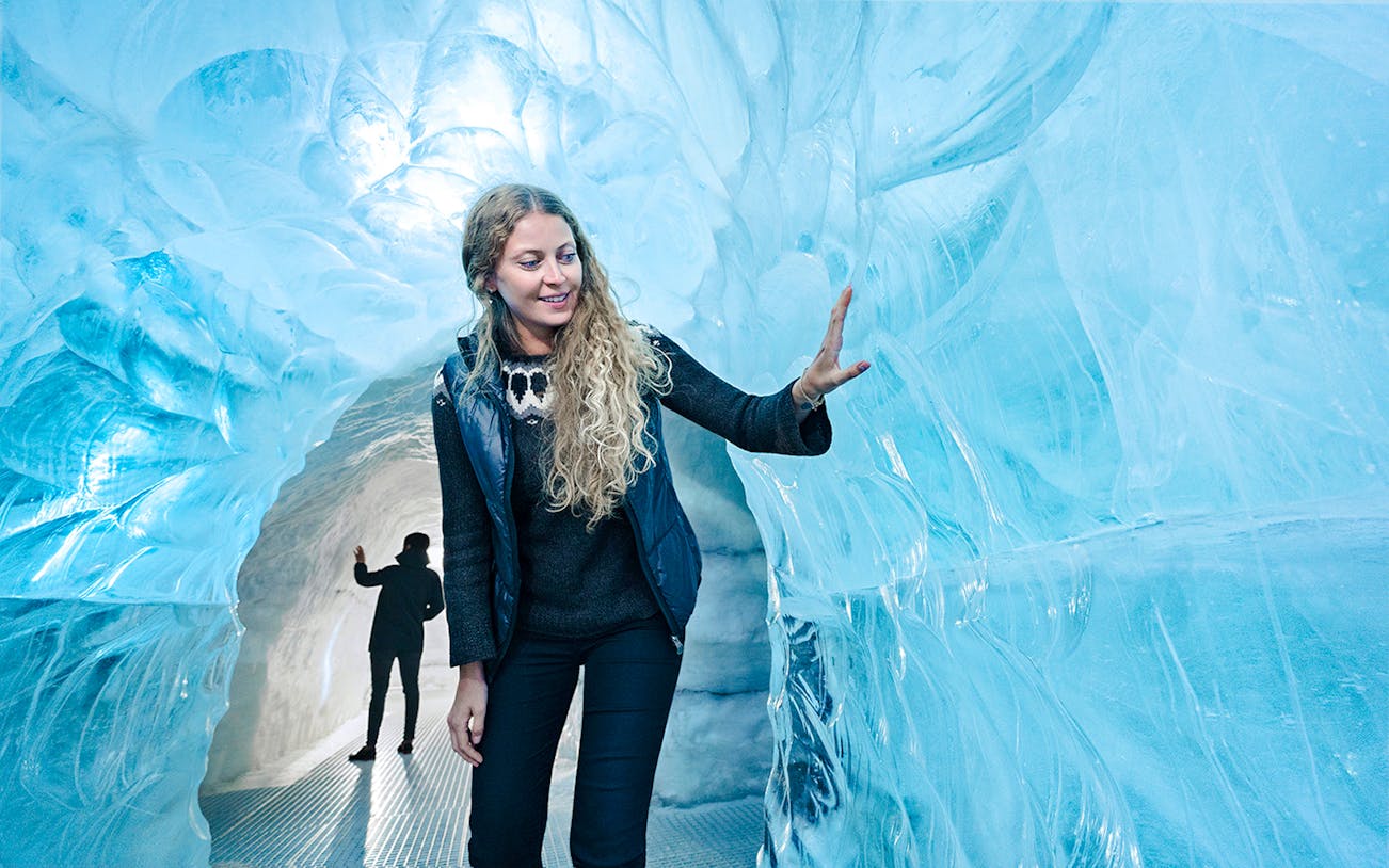 Visitor exploring ice cave at Perlan Museum, Reykjavik.