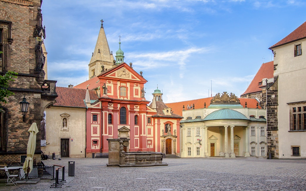 St. George's Basilica and courtyard at Prague Castle during a guided tour.