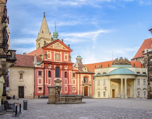 St. George's Basilica and courtyard at Prague Castle during a guided tour.