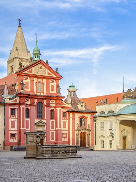 St. George's Basilica and courtyard at Prague Castle during a guided tour.