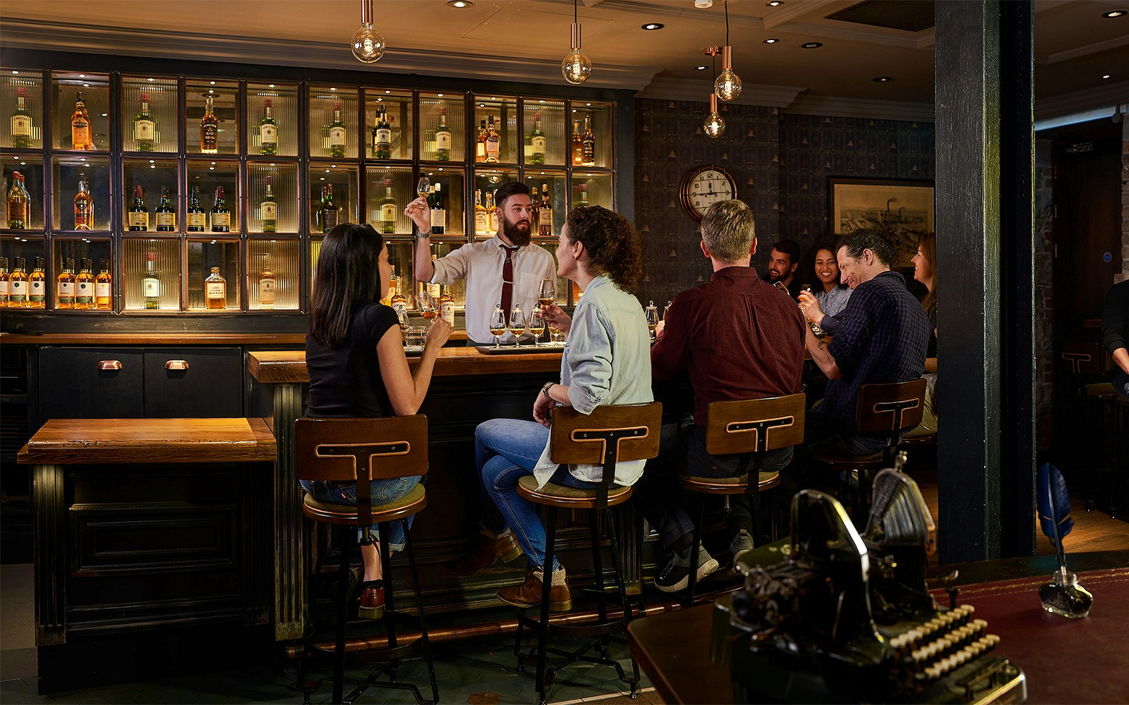 Jameson Distillery blending class in Dublin with participants crafting Black Barrel whiskey.