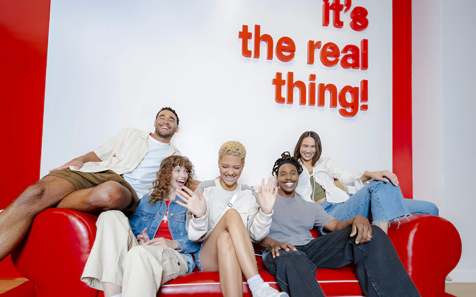 Group of friends enjoying inside World of Coca-Cola Museum, Atlanta.
