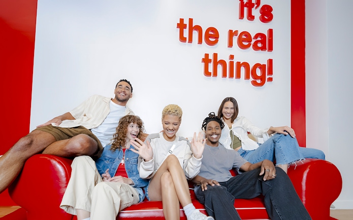 Group of friends enjoying inside World of Coca-Cola Museum, Atlanta.