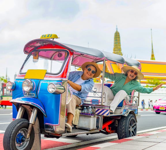 Tuk tuk ride near Wat Phra Kaew Temple, Bangkok.