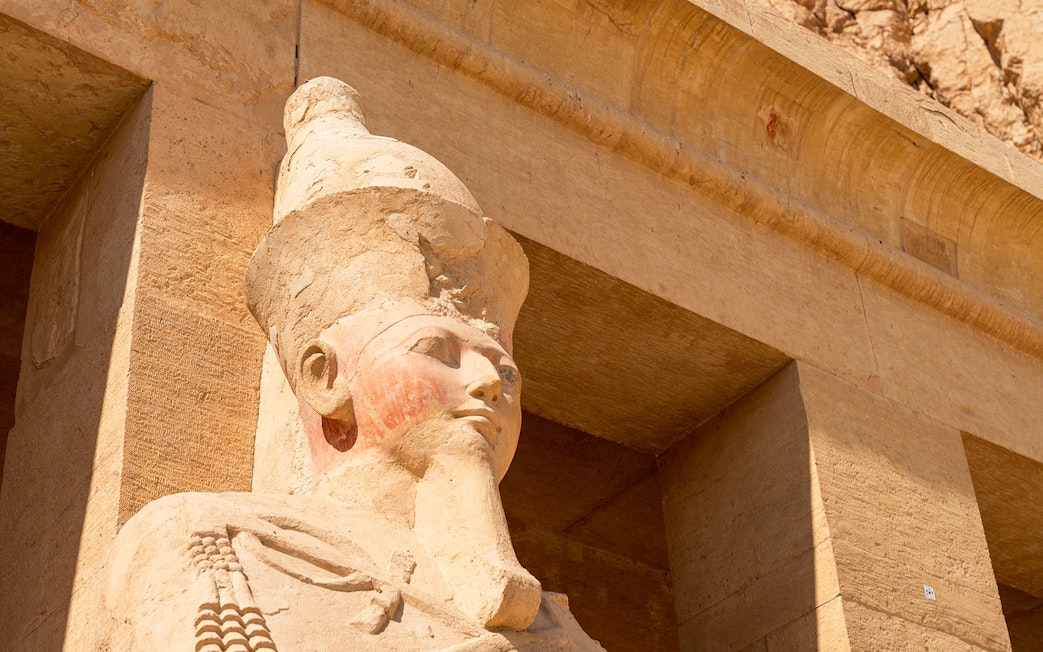 Statue of pharaoh's head at Hatshepsut Temple, Luxor, Egypt.