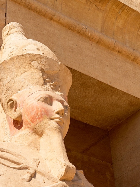 Statue of pharaoh's head at Hatshepsut Temple, Luxor, Egypt.