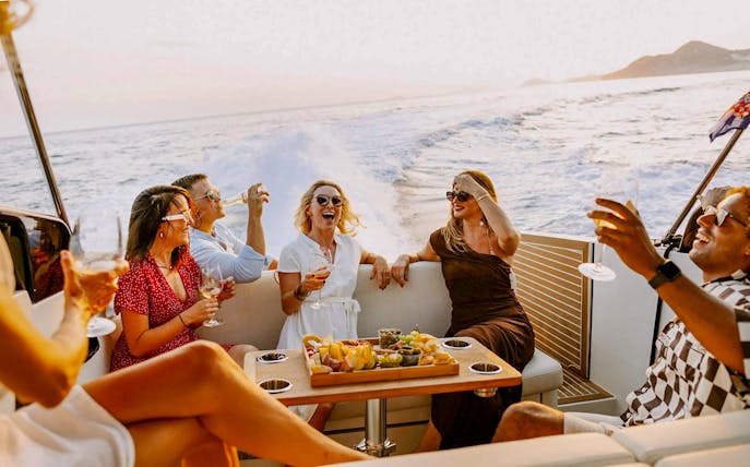 Guests enjoying drinks on a private sunset cruise in Dubrovnik.