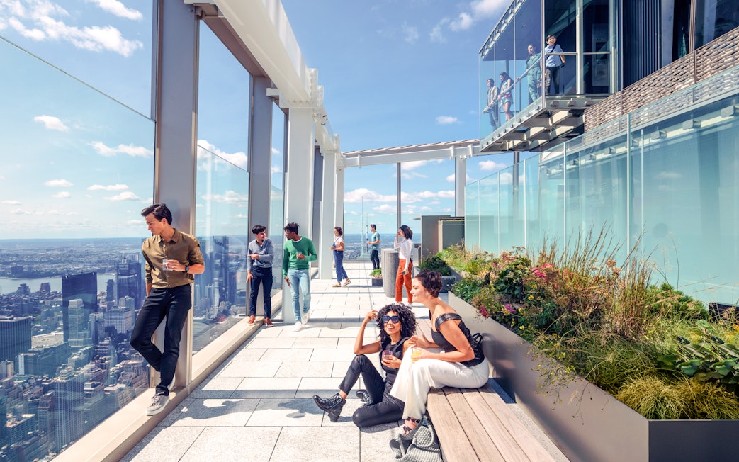 Group enjoying views from SUMMIT One Vanderbilt observation deck, New York City.