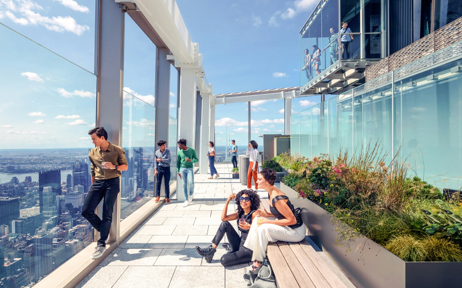 Group enjoying views from SUMMIT One Vanderbilt observation deck, New York City.