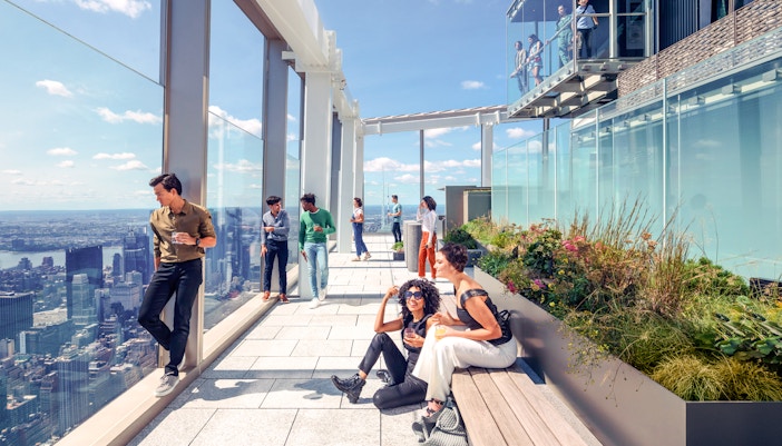Group of people on SUMMIT One Vanderbilt observation deck in New York City.