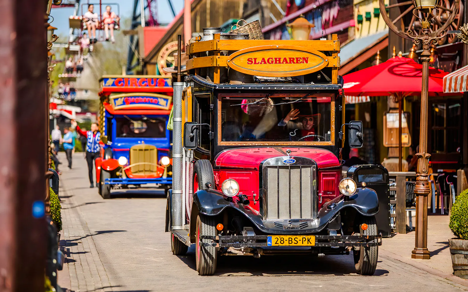 Vintage parade vehicles at Slagharen theme park.