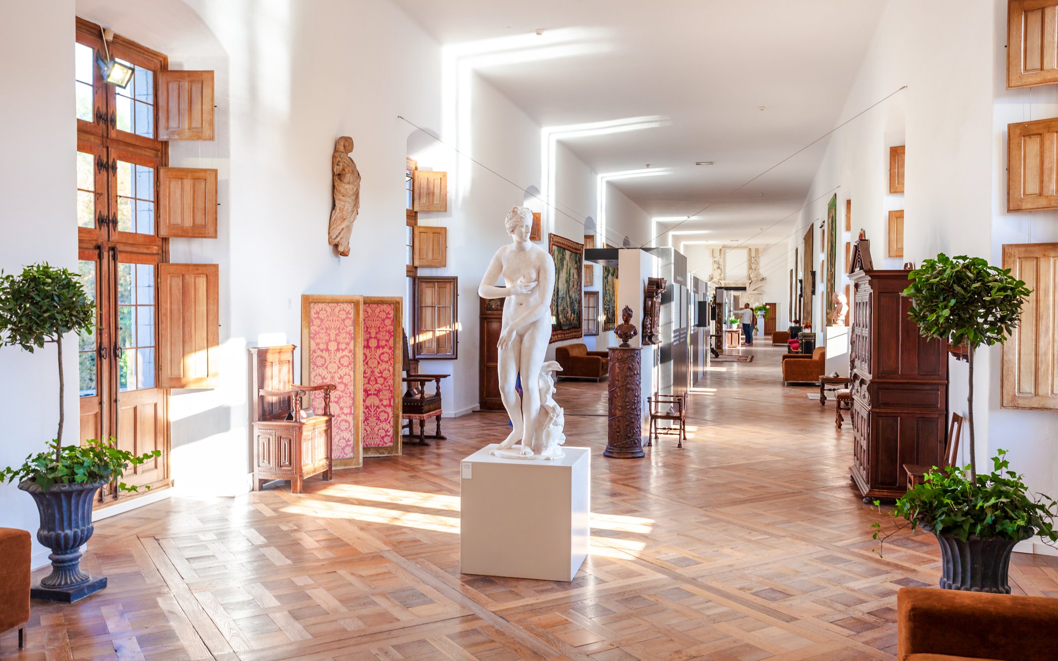 Château de Chenonceau interior hallway with sculptures, Loire Valley, France.