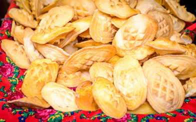 Cheese dumplings on a colorful cloth in Zakopane, Poland.