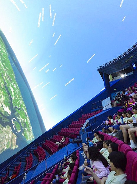 Visitors watching a planetarium show at Science Centre Singapore.