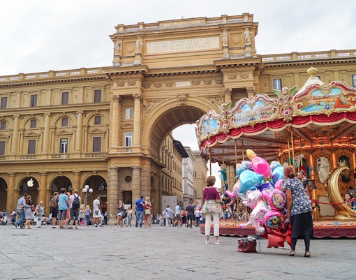 Piazza della Repubblica Milan with modern skyscrapers and bustling city life.