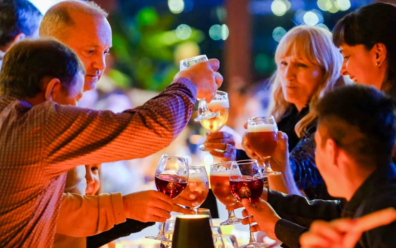 Guests toasting on a Bosphorus dinner cruise.