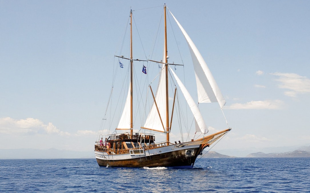 Traditional wooden gulet sailing on the Aegean Sea, Greece.