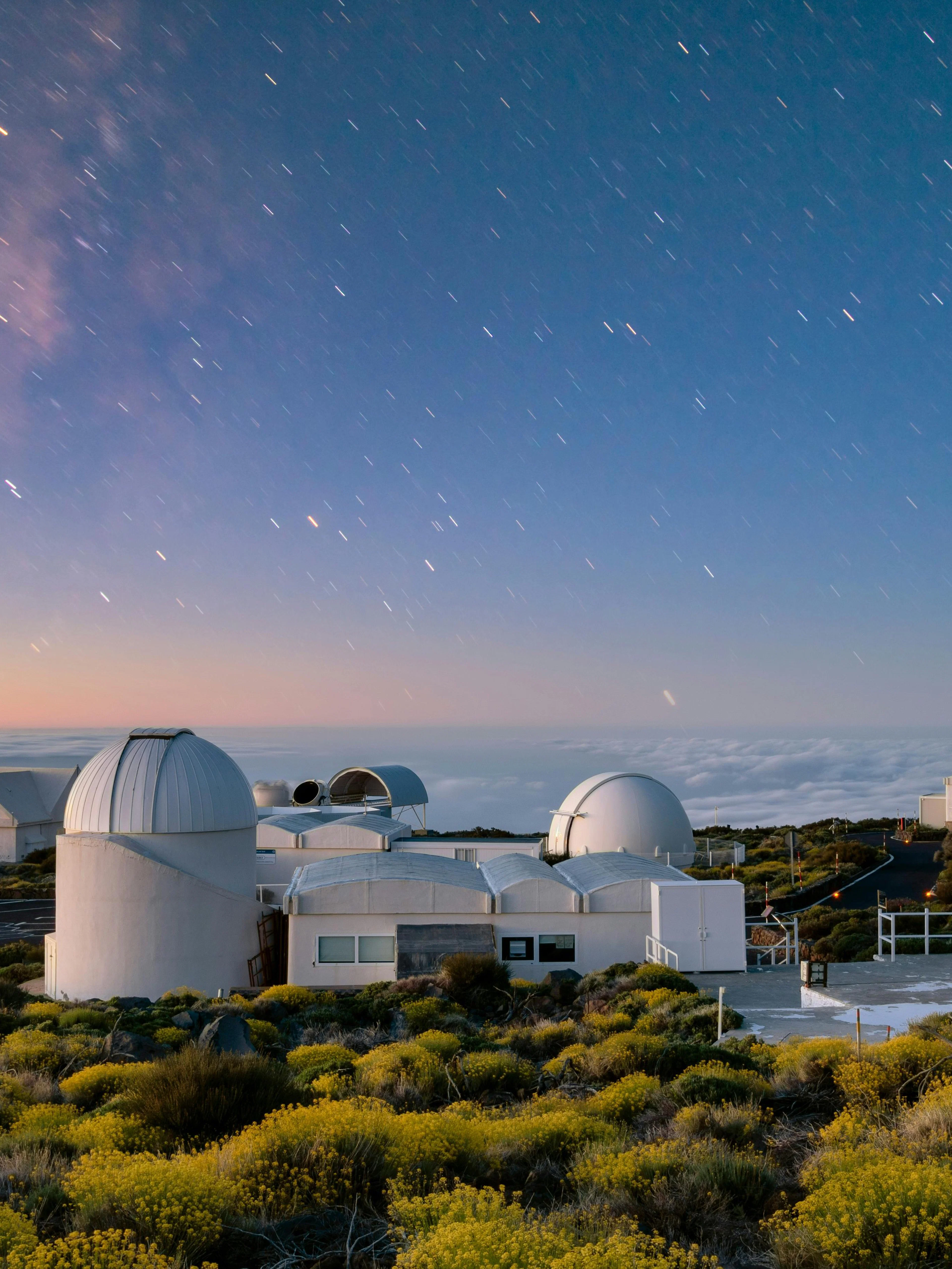 Astronomical observatory under starry sky in Teide National Park, Tenerife.