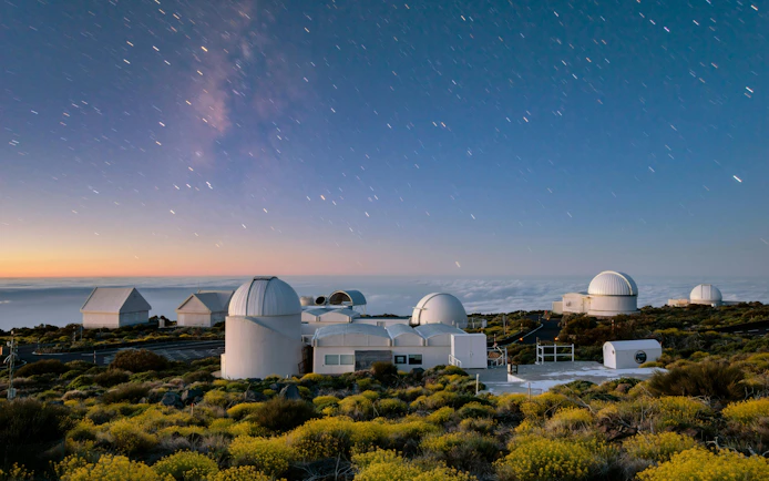 Astronomical observatory under starry sky in Teide National Park, Tenerife.