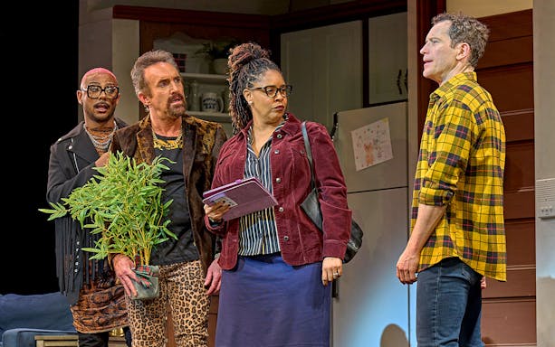 Group of actors in a scene from the Mrs. Doubtfire stage production.