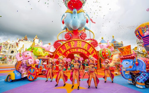 Performers in colorful costumes at Elephant in the Room, Carnival Magic, Phuket.