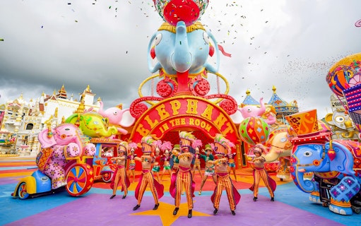Performers in colorful costumes at Elephant in the Room, Carnival Magic, Phuket.