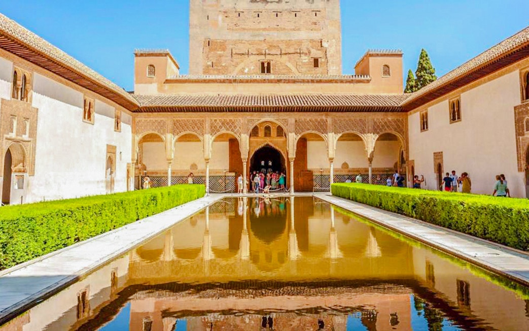 Court of the Myrtles with reflecting pool in the Nasrid Palaces, Alhambra, Granada.