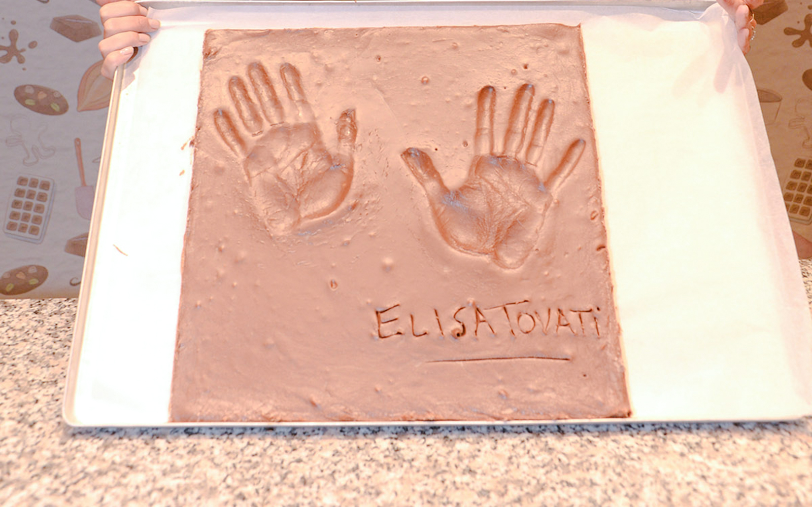 Handprints of Elisa Tovati at the celebrity wall of fame, Chocolate Museum, Paris, France.