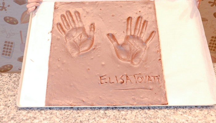 Handprints of Elisa Tovati at the celebrity wall of fame, Chocolate Museum, Paris, France.