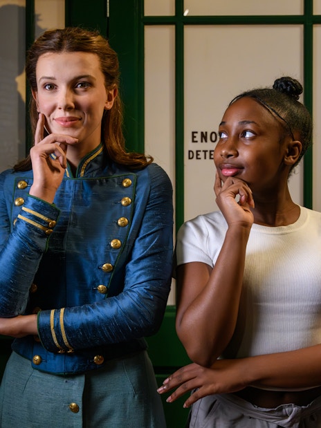 Enola Holmes wax figure with visitor at Madame Tussauds London.