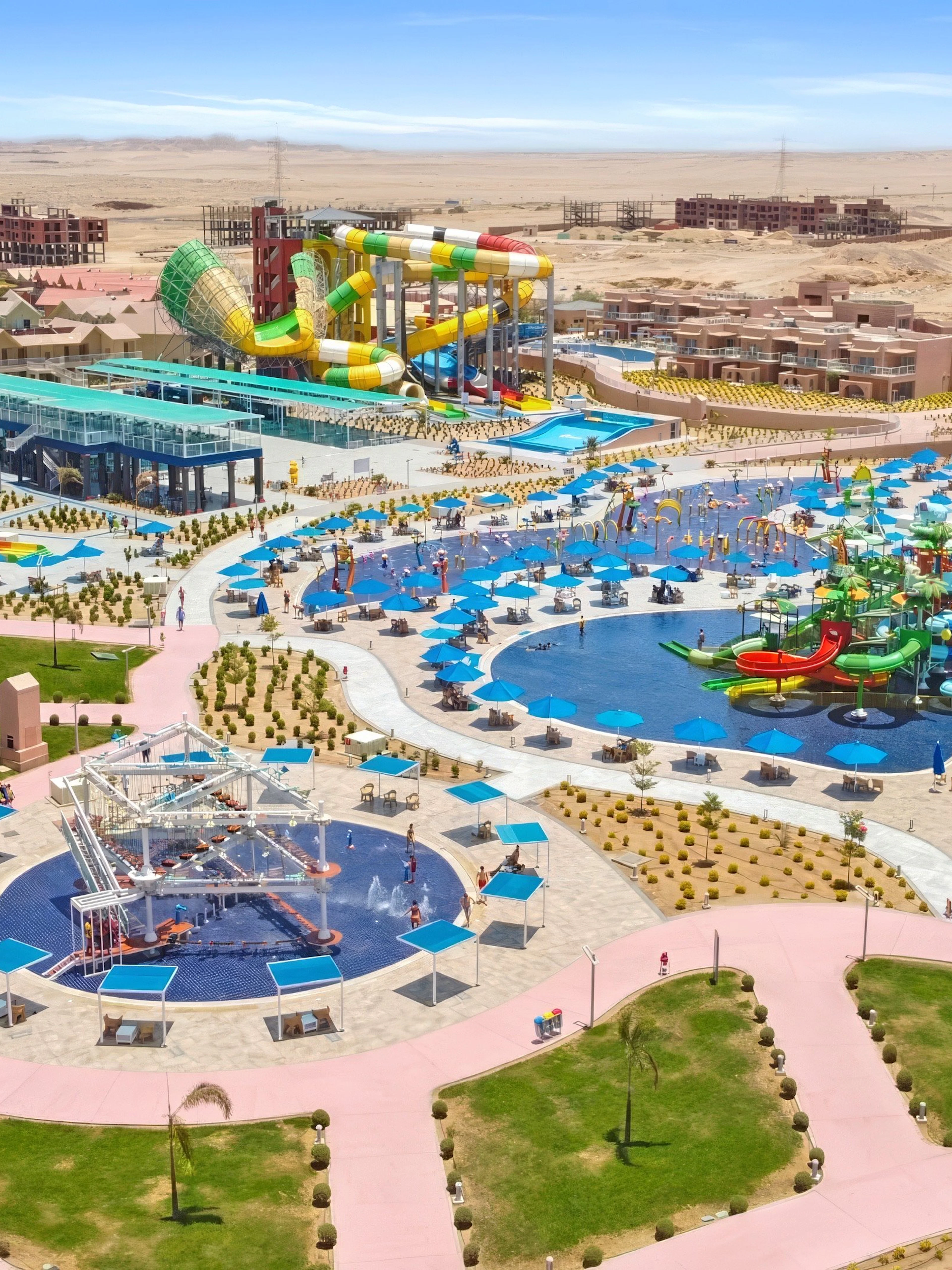 Aerial view of colorful water slides and pools at Neverland Waterpark, Pickalbatros, Hurghada.